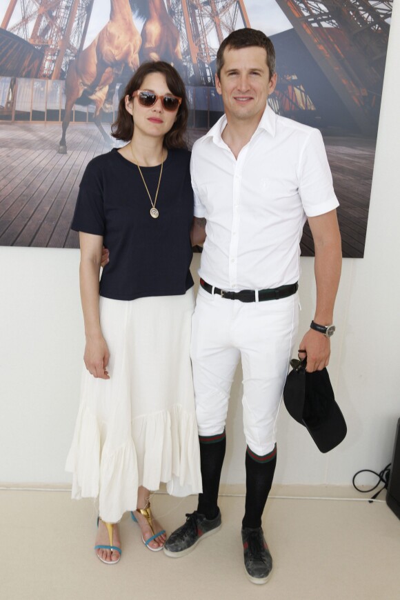 Exclusif - Marion Cotillard et son compagnon Guillaume Canet - People lors du Longines Paris Eiffel Jumping au Champ-de-Mars à Paris, le 4 juillet 2015.