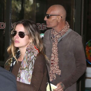 Exclusif -  Atteint d'un cancer, Christian Audigier, le styliste français made in Hollywood quitte l'hôpital Cedar Sinaï avec sa femme Nathalie Sorensen à Los Angeles le 6 avril 2015.