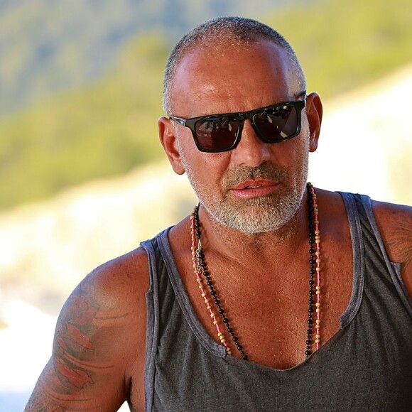 Exclusif - Christian Audigier et Nathalie Sorensen passent leurs vacances à Ibiza. Le 7 juillet 2013