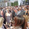 Le prince Albert II et et la princesse Charlene de Monaco saluent les Monégasques lors des célébrations des 10 ans de règne du prince Albert II de Monaco, le 11 juillet 2015.