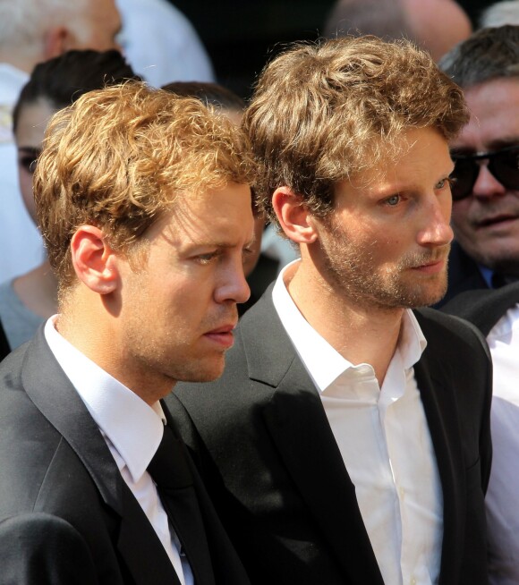 Sebastian Vettel et Romain Grosjean lors des obsèques de Jules Bianchi en la cathédrale Sainte-Réparate à Nice, le 21 juillet 2015