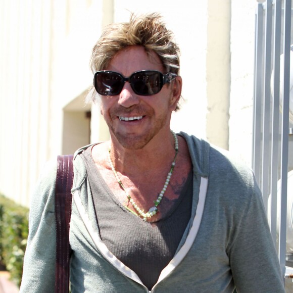 Mickey Rourke se promène dans les rues à Beverly Hills Los Angeles, le 25 juillet 2015