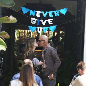 Exclusif - Christian Audigier, à la sortie du Cedar Sinaï Hospital avec sa femme Nathalie Sorensen à Los Angeles le 6 avril 2015