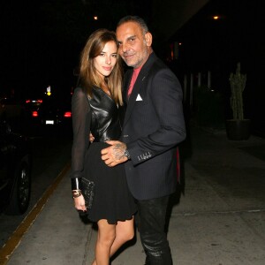 Christian Audigier et sa belle Nathalie Sorensen à la sortie du "Bootsy Bellows" à West Hollywood, le 6 octobre 2013