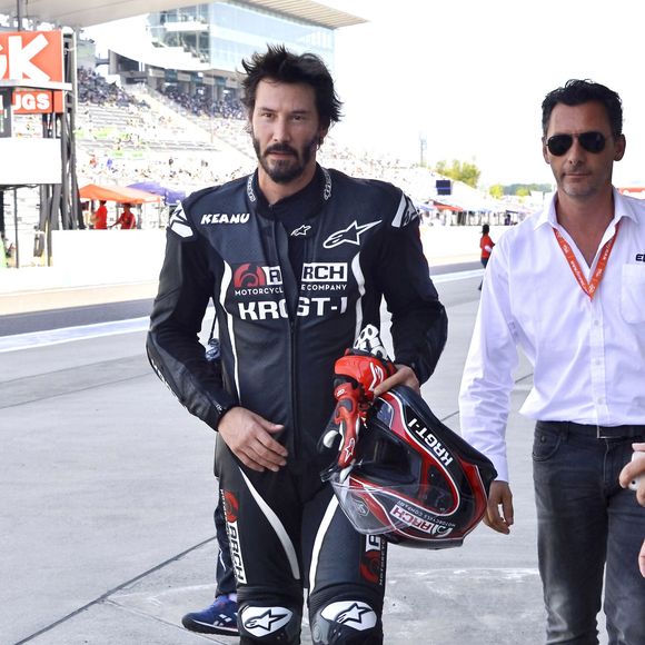 Keanu Reeves essaye sa moto sur le circuit de Suzuka au Japon le 25 Juillet 2015.