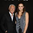 Alyson Le Borges, fille d'Anthony Delon, avec Giorgio Armani le 2 juillet 2013 au défilé Armani Privé lors de la Fashion Week haute couture de Paris.
