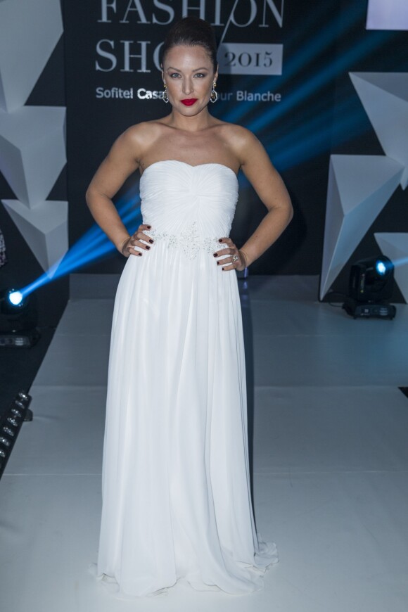 Natasha St-Pier (ici en robe bustier blanche Christophe Guillarmé au "Casa Fashion Show" au Sofitel Tour Blanche à Casablanca au Maroc le 28 mars 2015), enceinte de son premier enfant, a révélé le sexe du bébé.