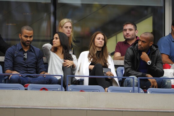 Thierry Henry et sa compagne Andrea Rajacic avec Tony Parker et son épouse Axelle à l'US Open en 2014