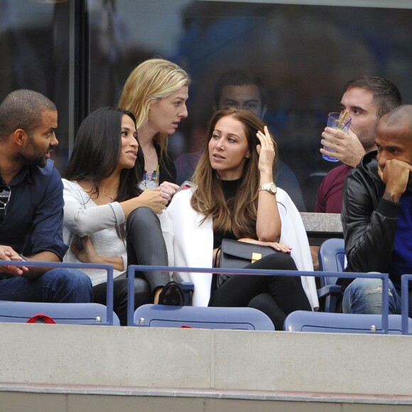 Thierry Henry et sa compagne Andrea Rajacic avec Tony Parker et son épouse Axelle à l'US Open en 2014
