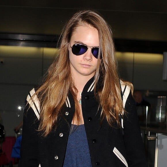 Cara Delevingne à l'aéroport de Heathrow le 29 juin 2015.