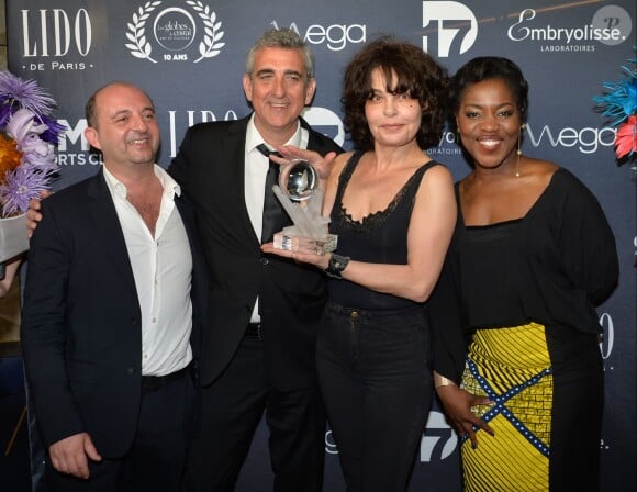 Jean-Louis Barcelona, Guest, Isabelle Mergault et Claudia Tagbo - Photocall de la remise des trophées lors de la 10ème cérémonie des Globes de Cristal au Lido à Paris, le 13 avril 2015.