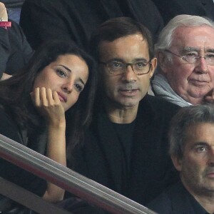 Jean-Luc Delarue et sa compagne Anissa. People au match de foot PSG-Nice au Parc des princes à Paris. En 2011.