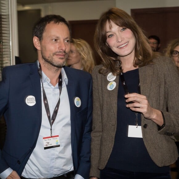 Marc-Olivier Fogiel et Carla Bruni Sarkozy - 11e édition du "BGC Charity Day" à Paris le 11 septembre 2015 en mémoire aux 658 collaborateurs du groupe BGC Partners (leader mondial du courtage interbancaire) disparus dans les attentats du World Trade Center, le 11 septembre 2001.