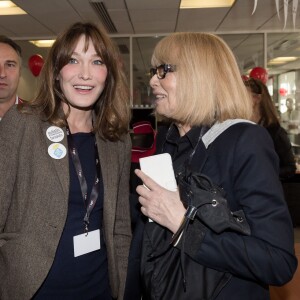 Carla Bruni Sarkozy et Mireille Darc - 11e édition du "BGC Charity Day" à Paris le 11 septembre 2015 en mémoire aux 658 collaborateurs du groupe BGC Partners (leader mondial du courtage interbancaire) disparus dans les attentats du World Trade Center, le 11 septembre 2001.