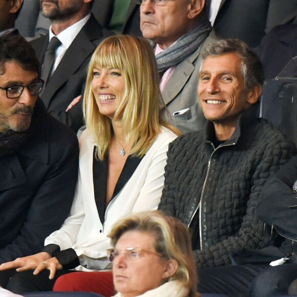 Pascal Elbé, Nagui et Mélanie Page lors du match de Ligue des Champions entre le PSG et Malmö au Parc des Princes à Paris le 15 septembre 2015