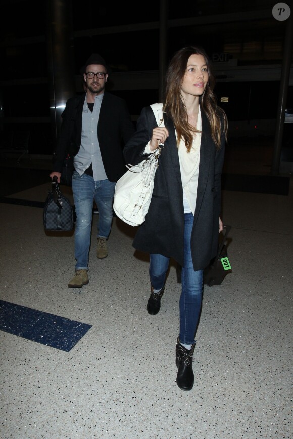 Justin Timberlake et sa femme Jessica Biel arrivent à l'aéroport LAX de Los Angeles. Le 27 mars 2014