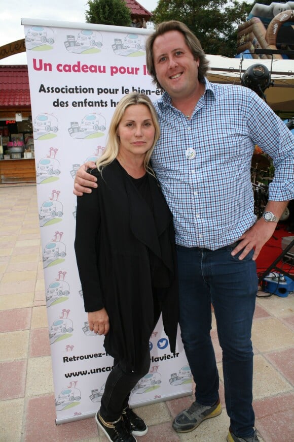 Exclusif - Sophie Favier et Bruno Proost, au parc d'attractions Le Royaume des Enfants, à Draveil, vendredi 4 septembre 2015.