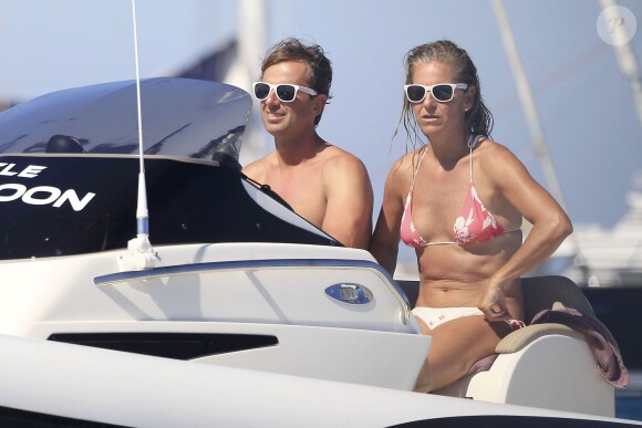 Exclusif - L'ancienne joueuse de tennis Arantxa Sanchez-Vicario et son mari à Ibiza le 12 août 2013.