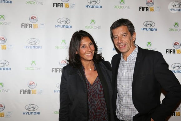 Michel Cymes et sa femme Nathalie - Soirée de lancement du jeu vidéo "FIFA 2016" au Faust à Paris, le 21 septembre 2015