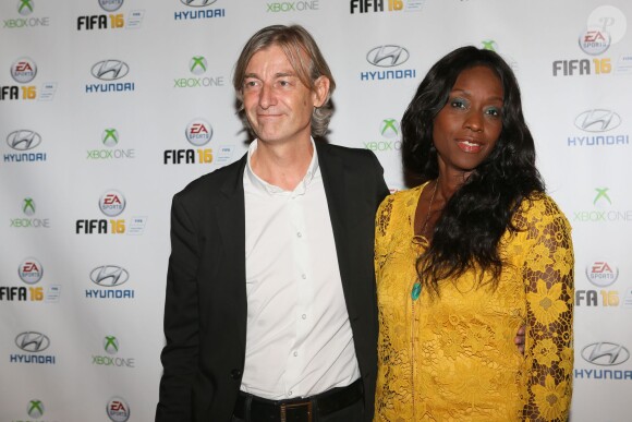 Gilles Verdez et sa compagne Fatou - Soirée de lancement du jeu vidéo "FIFA 2016" au Faust à Paris, le 21 septembre 2015