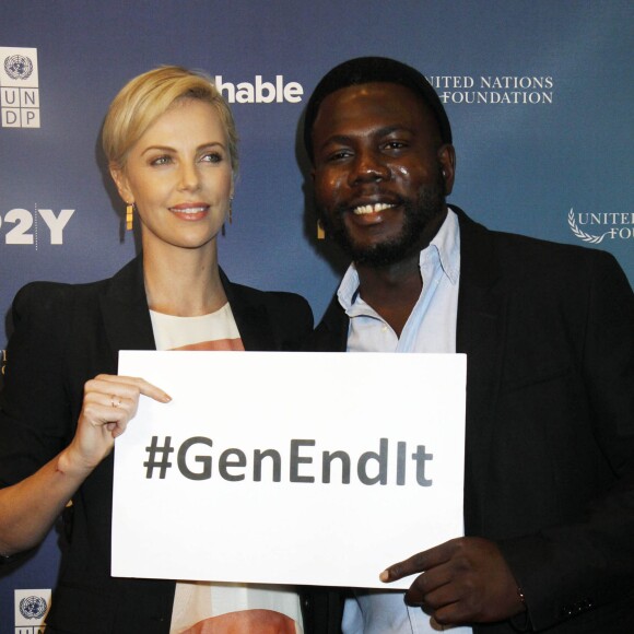 Charlize Theron, Kweku Mandela à la soirée 2015 Social Good Summit à New York, le 28 septembre 2015