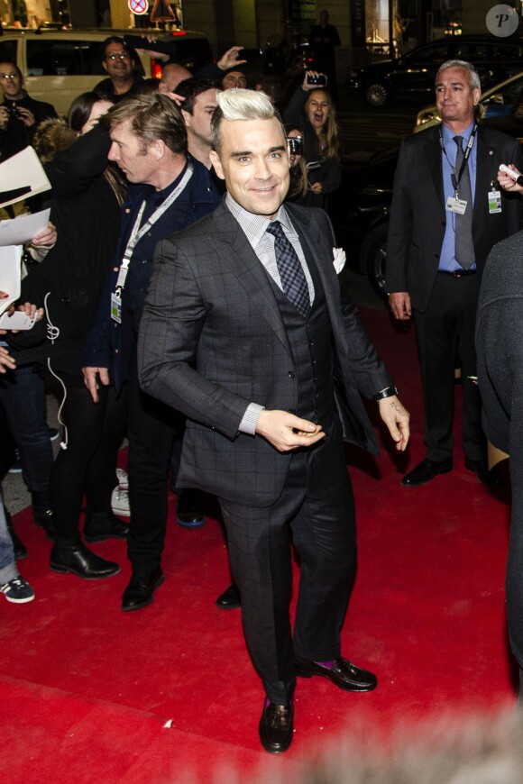 Robbie Williams (blond) lors de l'ouverture de "Drive" (Volkswagen Group Forum) à Berlin, le 28 avril 2015.