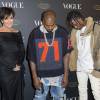 Kris Jenner, Kanye West et Travi$ Scott assistent à la soirée des 95 ans du magazine Vogue Paris, avenue d'Iéna. Paris, le 3 octobre 2015.