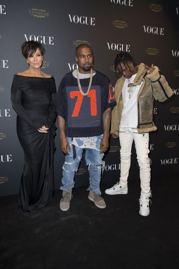 Kris Jenner, Kanye West et Travi$ Scott assistent à la soirée des 95 ans du magazine Vogue Paris, avenue d'Iéna. Paris, le 3 octobre 2015.