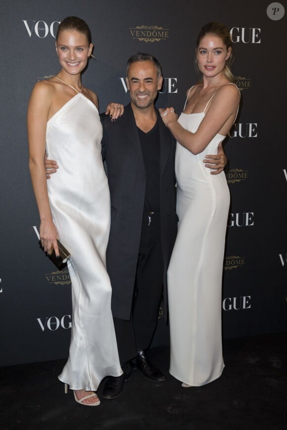 Doutzen Kroes, Francisco Costa (Calvin Klein Collection) et Constance Jablonski assistent à la soirée des 95 ans du magazine Vogue Paris, avenue d'Iéna. Paris, le 3 octobre 2015.