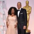 Oprah Winfrey et son compagnon Stedman Graham à la 87e cérémonie des Oscars à Hollywood le 22 février 2015