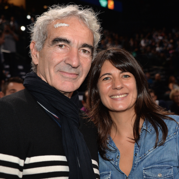 Raymond Domenech a subi une intervention - Raymond Domenech et sa compagne Estelle Denis - People lors de la finale du BNP Paribas masters entre Novak Djokovic et Andy Murray à l'Accor Hotels Arena à Paris le 8 novembre 2015.