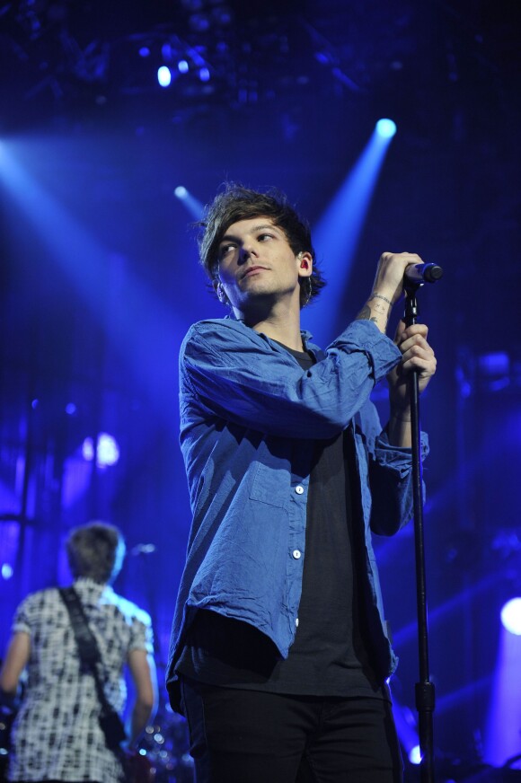 Louis Tomlinson lors du concert du groupe "One Direction" au Apple Music Festival à la Camden Roundhouse à Londres, le 22 septembre 2015.