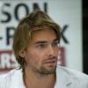 Camille Lacourt lors d'une séance de dédicaces du calendrier du Cercle des Nageurs de Marseille chez Cultura La Valentine à Marseille, le 22 octobre 2015
