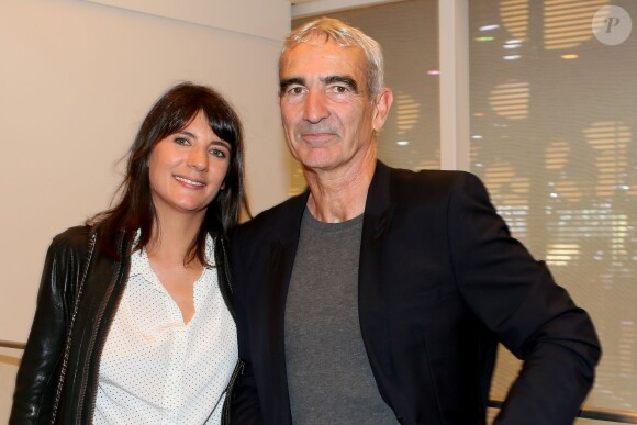 Estelle Denis et Raymond Domenech, à Paris le 2 octobre 2014.