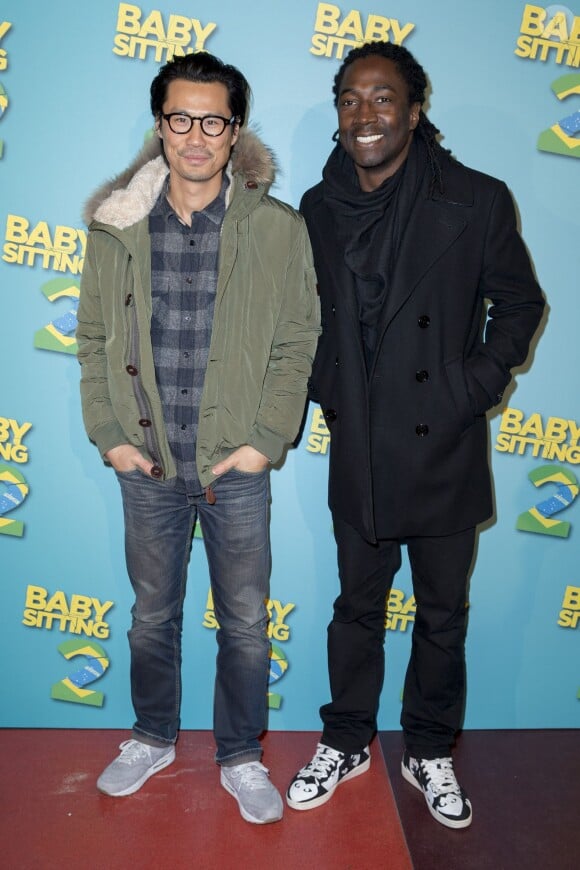 Frédéric Chau et Noom Diawara - Avant-première du film "Babysitting 2" au Gaumont Opéra à Paris, le 23 novembre 2015.