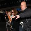 La chanteuse Adele et son fils Angelo Konecki arrivent à l'aéroport LAX de Los Angeles le 3 janvier 2015