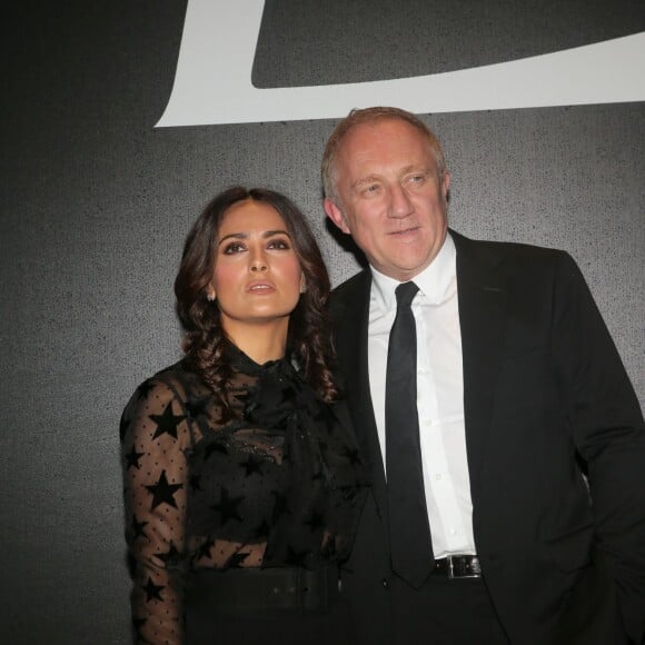 Salma Hayek et son mari François-Henri Pinault - People au défilé de mode "Saint Laurent", collection prêt-à-porter printemps-été 2016, à Carreau du Temple à Paris le 5 Octobre 2015