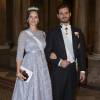La princesse Sofia, enceinte, et le prince Carl Philip de Suède - Dîner du roi pour les lauréats du Prix Nobel au palais royal à Stockholm le 11 décembre 2015.