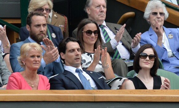 Michelle Dockery et John Dineen lors d'un match de tennis à Wimbledon, à Londres, le 27 juin 2014