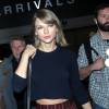 Taylor Swift arrive à l'aéroport Lax de Los Angeles le 13 décembre 2015.