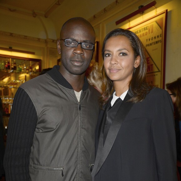 Lilian Thuram et Karine Le Marchand lors de la soiree de gala pour l'association "Un Coeur Pour la Paix " à l'occasion du spectacle d'Ary Abittan au Théâtre Edouard VII à Paris le 24 juin 2013