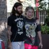 La chanteuse Kesha et son compagnon Brad Ashenfelter portent des t-shirts de musique métal à Los Angeles le 21 octobre 2015. © CPA/Bestimage