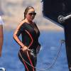 Mariah Carey, en vacances à Ibiza sur le bateau Arctic de son compagnon James Packer prend un petit bain de mer rapide dans une combinaison qui souligne de près les courbes de son corps. Le 1er juillet 2015