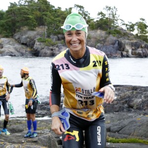 Pippa Middleton et son frère James ont bouclé le 7 septembre 2015 en Suède, avec leurs amis James Matthews et Jons Bartholdson, la course Otillo - 10 km de nage en eau libre et 65 km de trail.