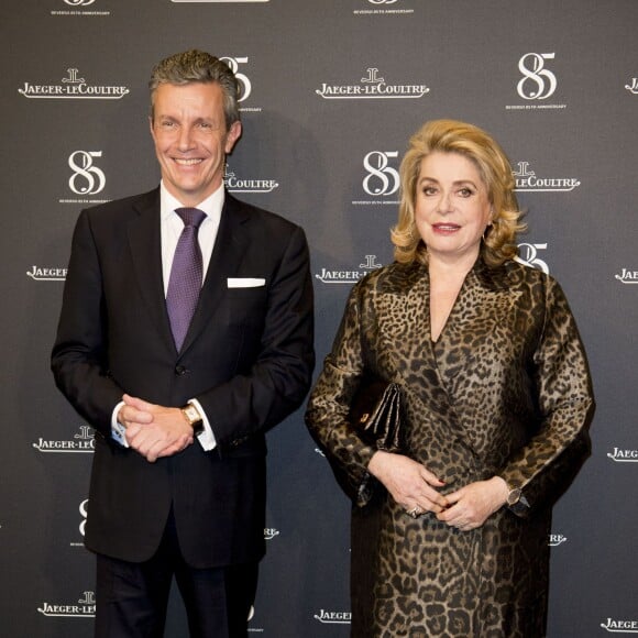 Daniel Riedo (PDG de Jaeger-LeCoultre) et Catherine Deneuve - Photocall du 85ème anniversaire de la montre Jaeger-LeCoultre Reverso à Genève le 18 janvier 2016