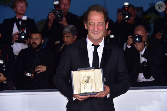 Vincent Lindon (prix d'interprétation masculine pour le film "La Loi du Marché") - Photocall de la remise des palmes du 68e Festival du film de Cannes, le 24 mai 2014.