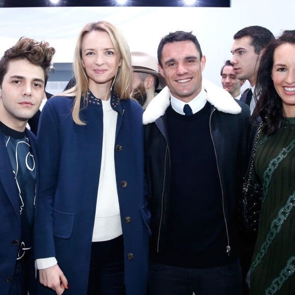 Xavier Dolan, Delphine Arnault, Dan et Honor Carter - Défilé Louis Vuitton (collection homme automne-hiver 2016-2017) à la serre du parc André-Citroën. Paris, le 21 janvier 2016.