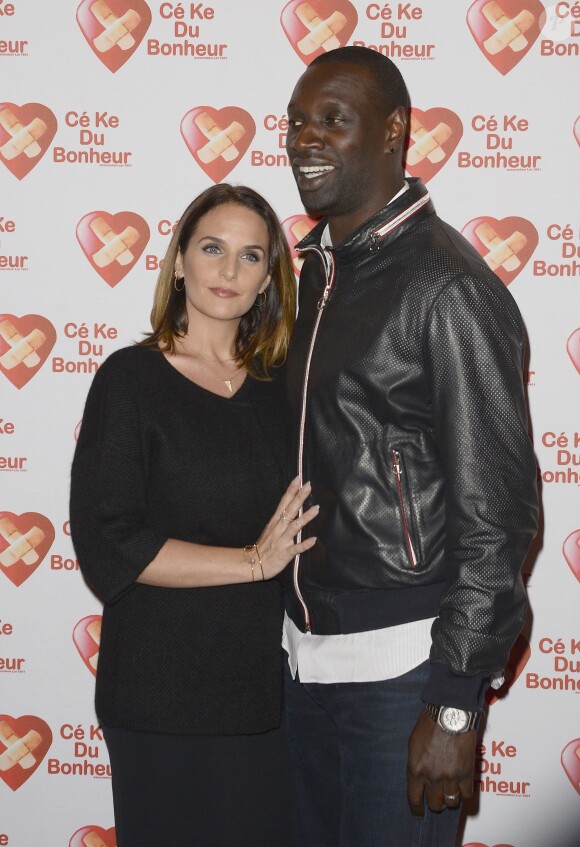 Omar Sy et sa femme Hélène - Avant-Première du film "Samba" au Gaumont Champs-Elysées Marignan à Paris pour l'association "Cé Ke du Bonheur" à Paris le 14 octobre 2014. 