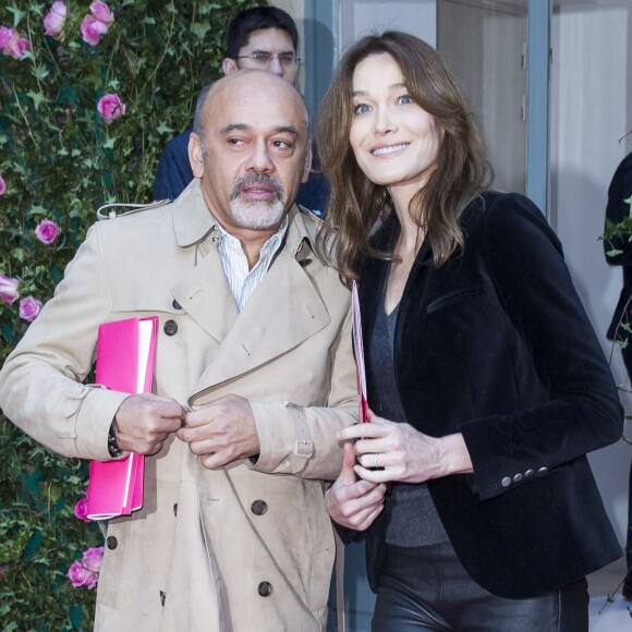 Christian Louboutin et Carla Bruni-Sarkozy - Arrivées au défilé de mode Haute Couture Schiaparelli, printemps 2016, à Paris le 25 janvier 2016.