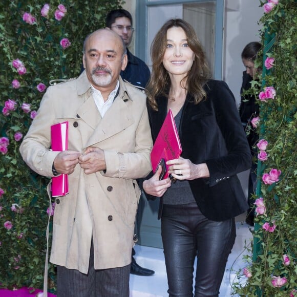 Christian Louboutin et Carla Bruni-Sarkozy - Arrivées au défilé de mode Haute Couture Schiaparelli, printemps 2016, à Paris le 25 janvier 2016.